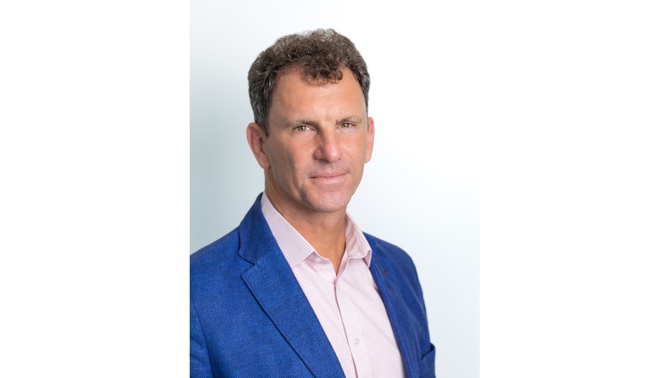 a headshot of John Steele 
